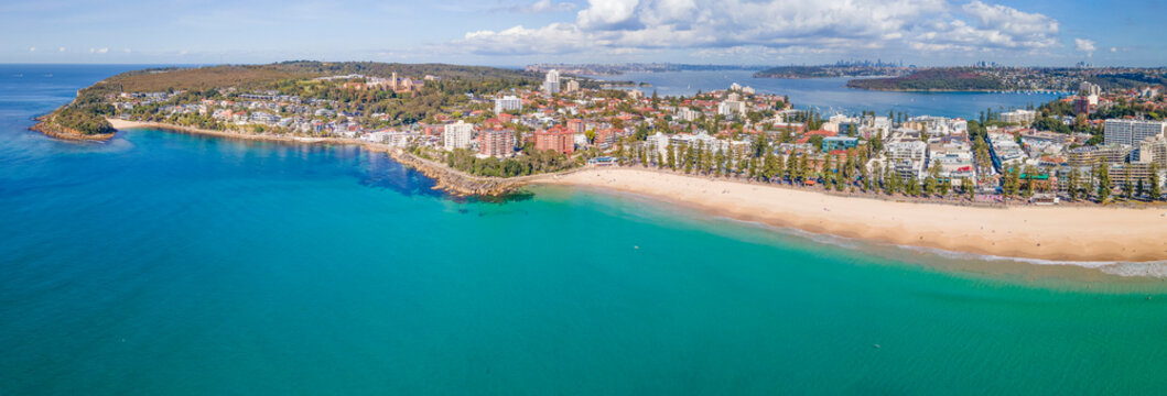 Aerial drone panoramic view of Manly Beach on the Northern Beaches of Sydney, NSW Australia with Shelly Beach to the left direction and the Northern Harbour of Sydney in the background 