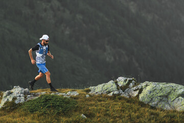 A trail runner trains in the mountains
