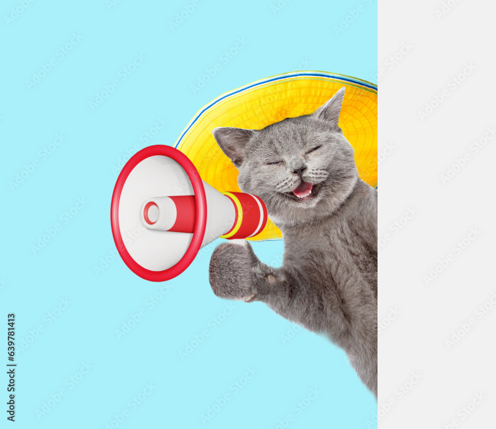 Poster happy cat wearing summer hat talks into megaphone and looks from behind empty white banner. isolated