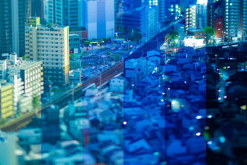 A sliced photography of cityscape by high angle view near the railway in Osaka 
