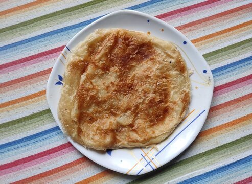 Bakarkhani or Baqarkhani, also known as bakar khani roti, is a thick, spiced, sweet flat-bread that is part of the Mughlai cuisine. It is prepared on certain Muslim religious festivals. 