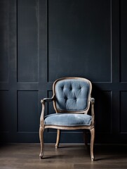 Blue fabric dining chair against dark stucco wall.
