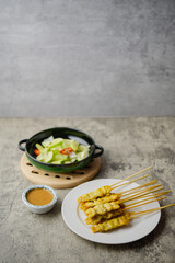 Satay is a dish made from thinly sliced ​​or cubed meat. skewered with wooden skewers made of bamboo Then grilled on a wood or charcoal stove. Served with spicy condiments.