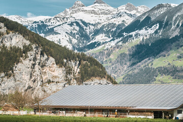 House with solar panels. Concept of sustainable and renewable energy.