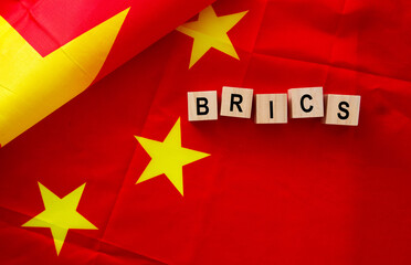 China flag and BRICS words.