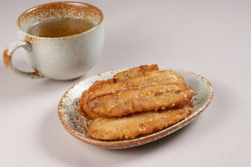 Kluay Kaek is Thai Banana Fritters with Sesame Seed, Popular Street Food. 