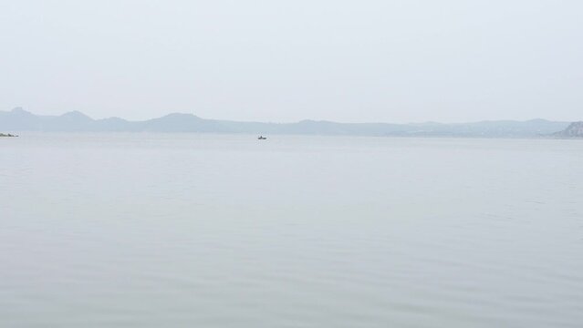 Big Lake view , small Barishal in long distance