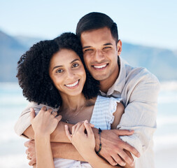 Obraz premium Happy, couple and portrait on beach in Brazil holiday, vacation or travel for summer break at the ocean, waves or sea. People, smile and love a tropical adventure together for honeymoon or marriage