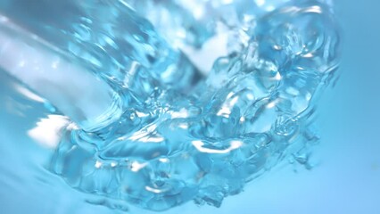 Super Slow Motion Detail Shot of Pouring and Splashing Water at 1000 fps.