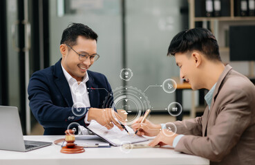 business people and lawyers discussing contract papers sitting at the table. Concepts of law, advice, legal services.