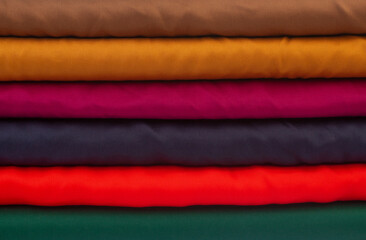Background from stack of colorful fabrics