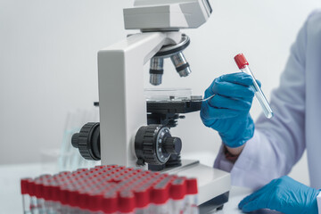 Image of a researcher's hands testing water quality in a lab.Effects of Water Pollution on Human Health and Disease