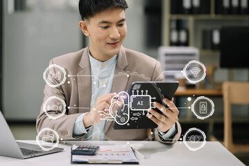 Artificial Intelligence technology. Businessman using a tablet and laptop computer chatting with an...