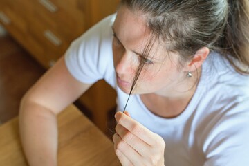 Trichotillomania concept. Human impulse behavioral problem,hair pulling disorder.