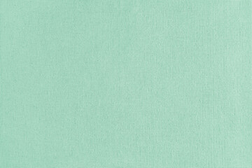 Texture background of turquoise cotton fabric. Textile structure, cloth surface, weaving of linen fabric closeup, backdrop, wallpaper.