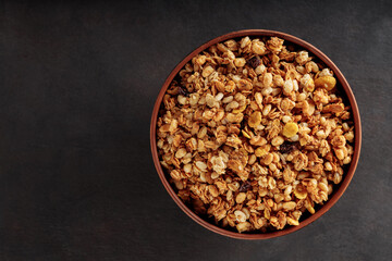 Nutty Granola Snack in Clay Bowl. Top View