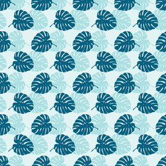 Tropical leaves seamless pattern of Monstera philodendron leaves in blue color tone, tropical background. © Tanita