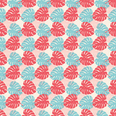 Tropical leaves seamless pattern of Monstera philodendron leaves in pink blue color tone, tropical background. © Tanita