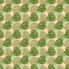 Tropical leaves seamless pattern of Monstera philodendron leaves in green color tone, tropical background. © Tanita