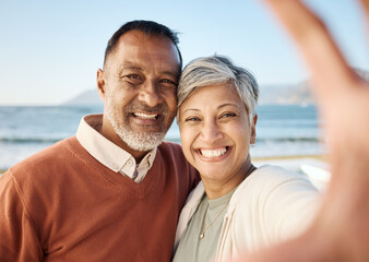 Fototapeta premium Senior couple, beach selfie and portrait with happy memory, care and bonding on vacation in summer sunshine. Man, woman and smile together for photography, profile picture or social media post by sea