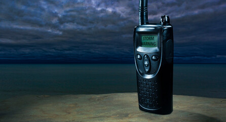 Storm warning flashing on a portable radio
