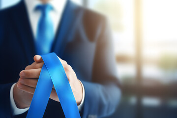 Blue November Prostate Cancer Awareness month, Man hand holding Blue Ribbon