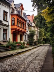 Street with traditional private houses. Residential architecture exterior.