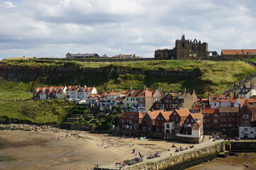 Whitby – with the 13 century Abbey  and the Church of Saint Mary on the cliff overlooking the...