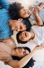 Above, laughing and portrait of a family on the bed for bonding, love and comic conversation. Together, house and parents with children for talking, jokes or funny communication in the bedroom