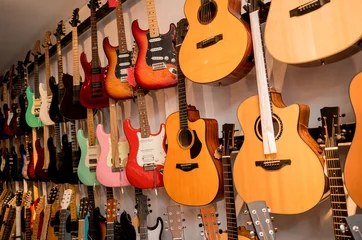 Wall murals Music store Many rows of classical guitars in the music shop