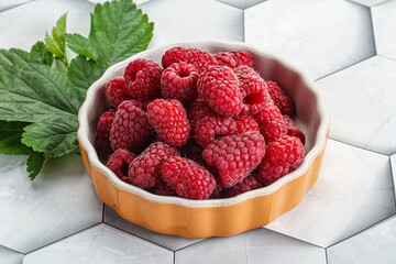 Rope sweet juicy raspberry heap