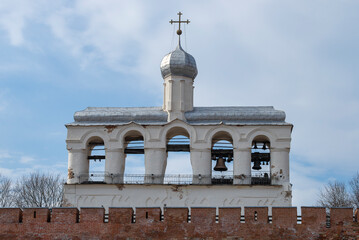 Ancient belfry of St. Sophia Cathedral on a cloudy April day. Veliky Novgorod, Russia