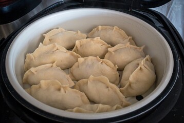 Traditional food cooked on steam in slow cooker. High quality photo