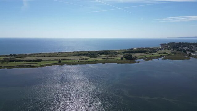 Dawlish Warren, South Devon, England: DRONE VIEWS: The River Exe, the sea, Dawlish Warren and the mainland railway line (right). The River Exe and Dawlish Warren are popular UK holiday resorts.