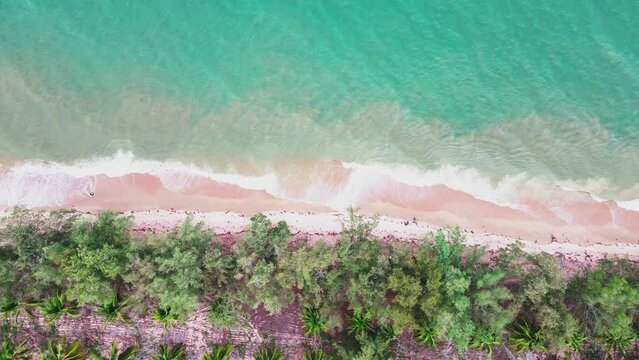 Tropical seas, beautiful turquoise waters, fishing boats stands on the seashore on a sandy beach. 