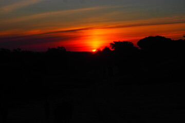 Golden yellow and orange sunset in the mountains