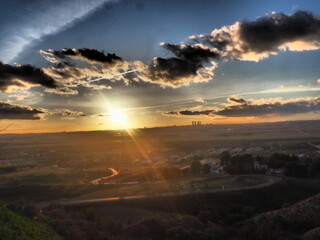 Golden yellow and orange sunset in the mountains