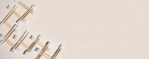 Geometric composition from bamboo ear sticks.