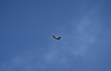 Aerial acrobatics airshow. Ultra light airplanes doing acrobatics in air against amazing blue sky. Aviation industry concept image.
