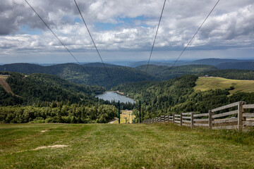 Ski area with a ski lift in the French Vosges, close to the mountain called 'Grand ballon'. Photo...