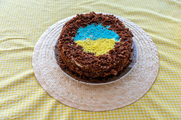 Handmade chocolate cake, decorated with the flag of Ukraine
