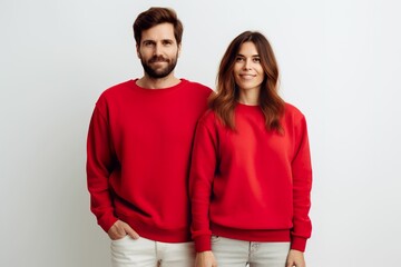 Man and woman mannequin showing red t-shirt sweatshirt sweater long sleeves on white background, new year and christmas red couple clothing display, winter couple clothing mockup