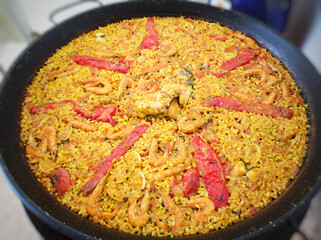 Seafood paella typical dish of the Valencia. - 639909211