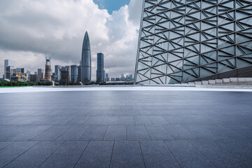 City square and skyline with modern buildings in Shenzhen, Guangdong Province, China.
