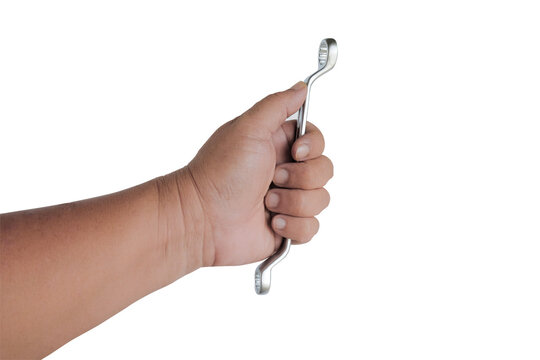 Hand holds a spanners isolated on white background.clipping path.
