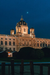 Fototapeta na wymiar Nightview on the Museum Building in Vienna with the moon above