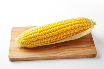 sweet corn on the wooden cob white background