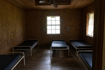 Empty summer camp beds waiting for campers.