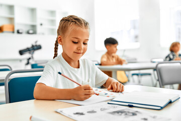 Children learning in a school classroom
