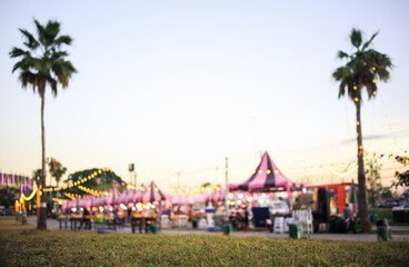 Blur image of flea market and food fair in Chiang mai city of Thailand. Also called festive food,...